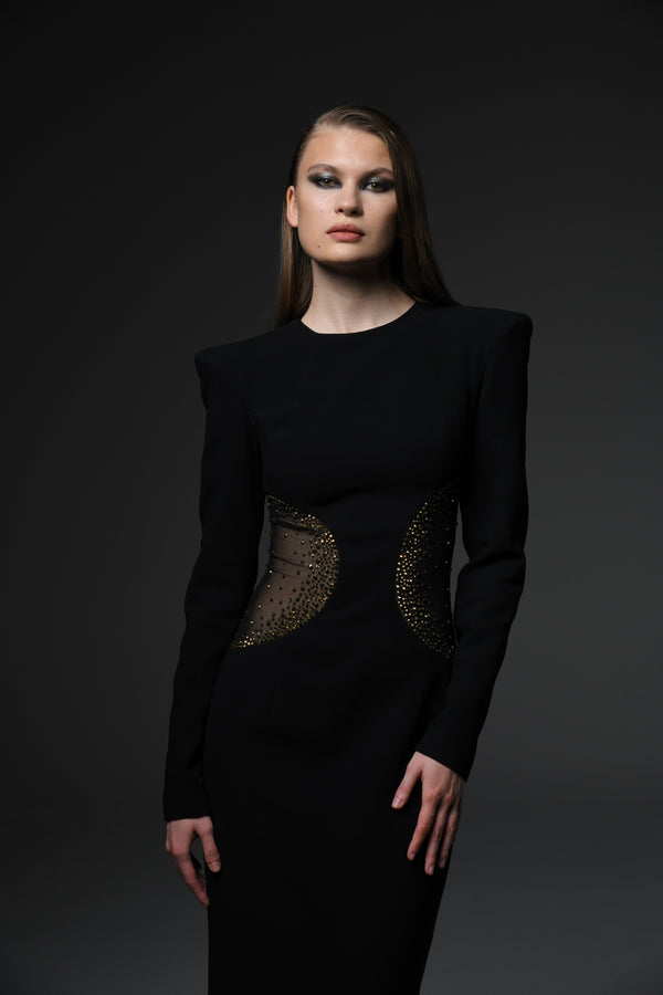 Black crêpe dress featuring crystal studded tulle cutouts