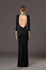 Backless black jersey dress with crystal chainmail on the neckline and sleeves