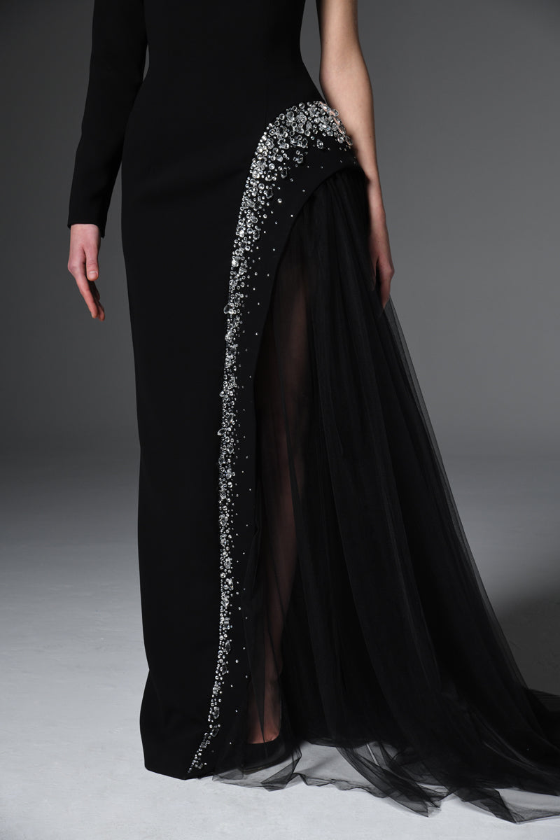 Black asymmetric crêpe dress with crystal embroidery and tulle on the side slit