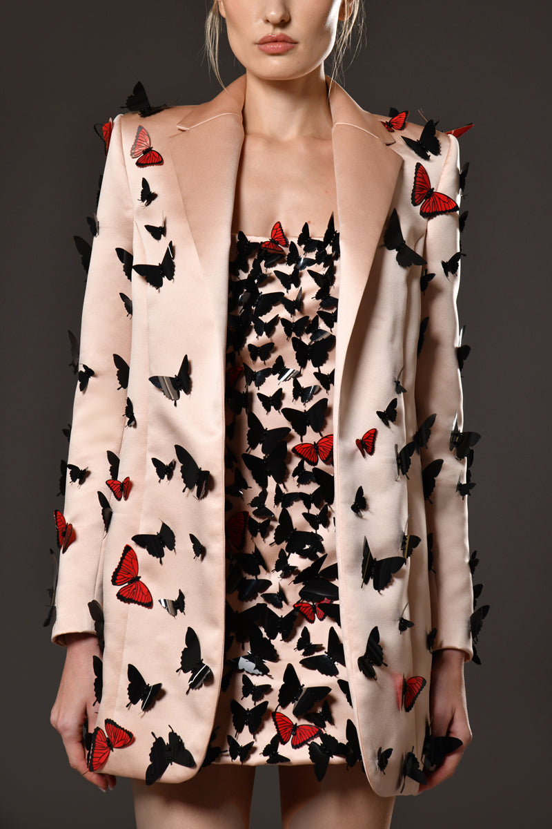 Structured peach blazer with hand stitched laser-cut butterflies