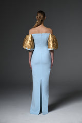  Light blue crêpe dress with feathers on sleeves