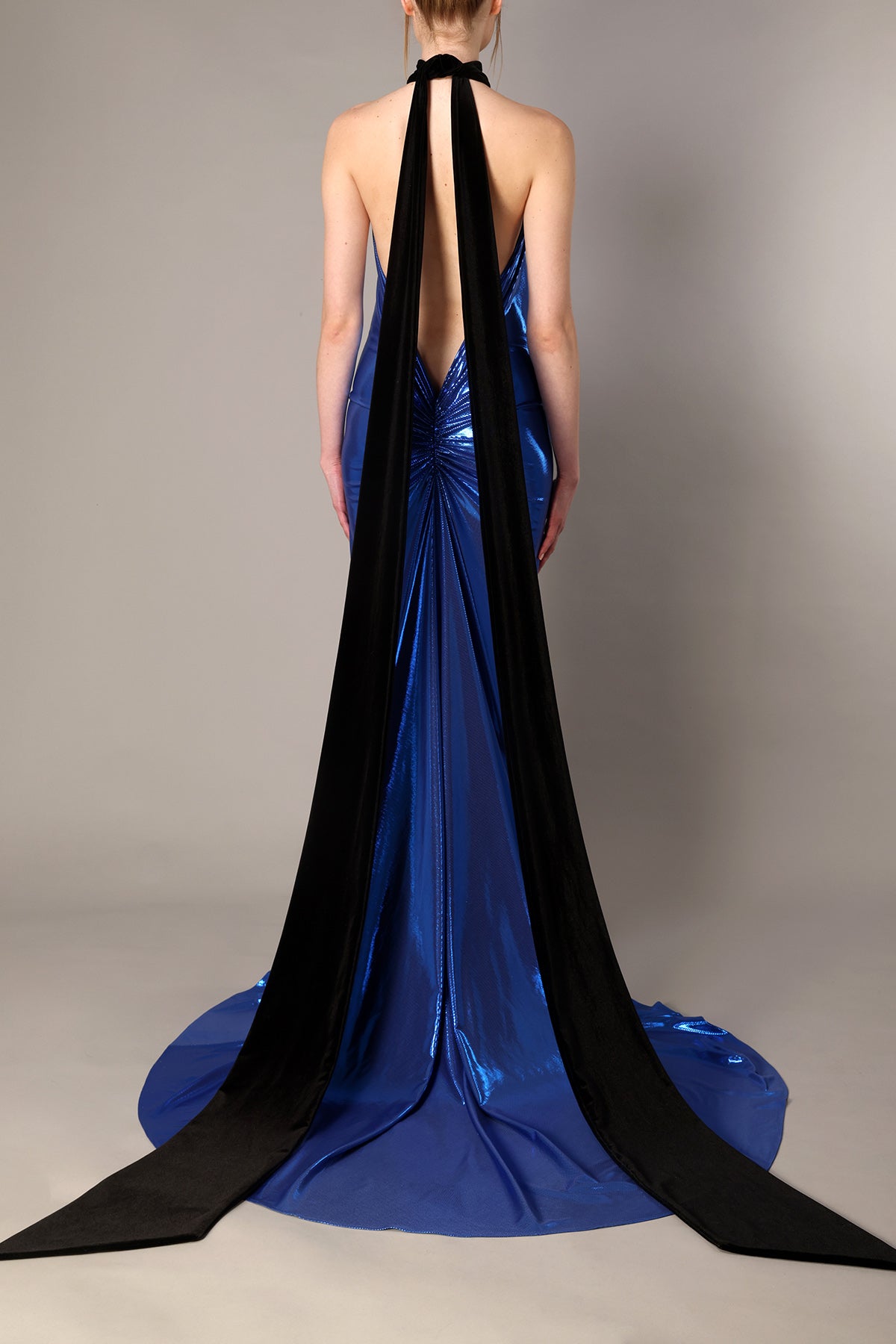 Blue lamé dress with black velvet floor sweeping tie