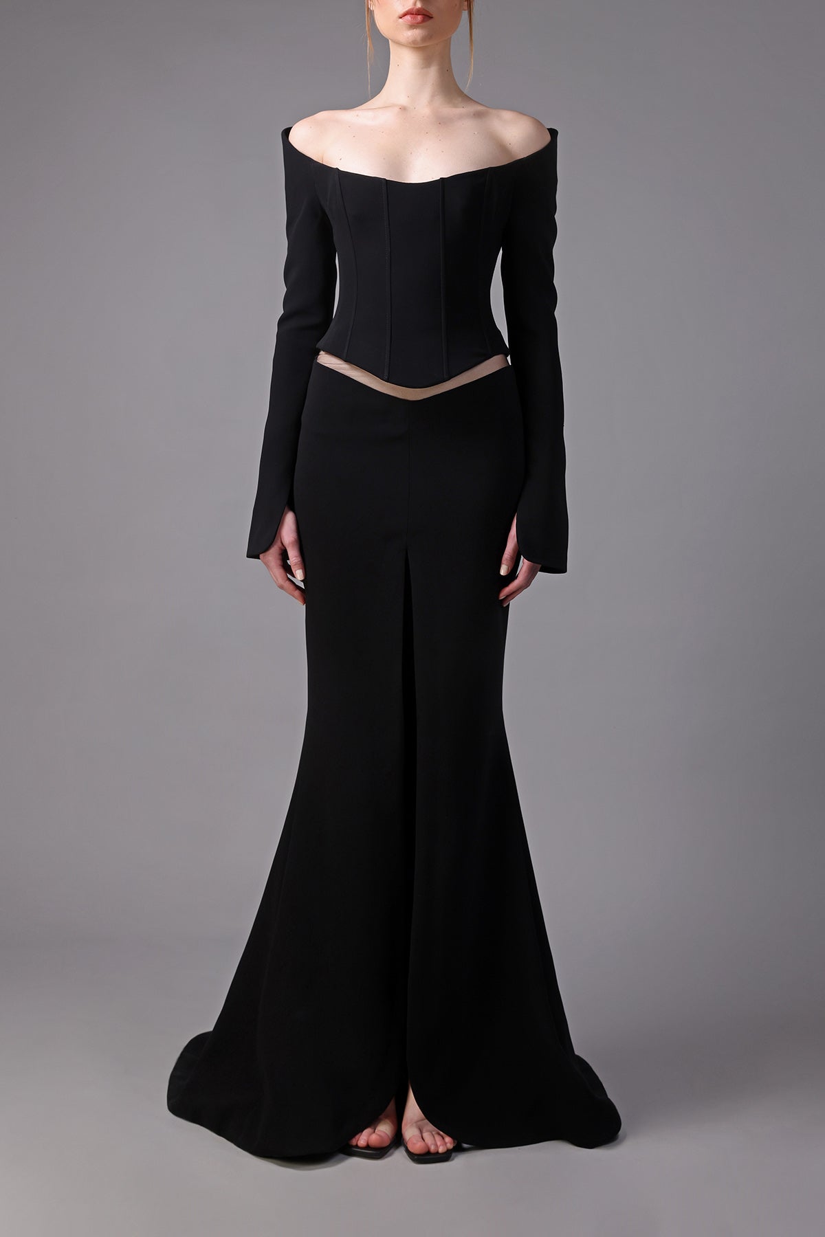 Black mermaid cut skirt and corset with long sleeves