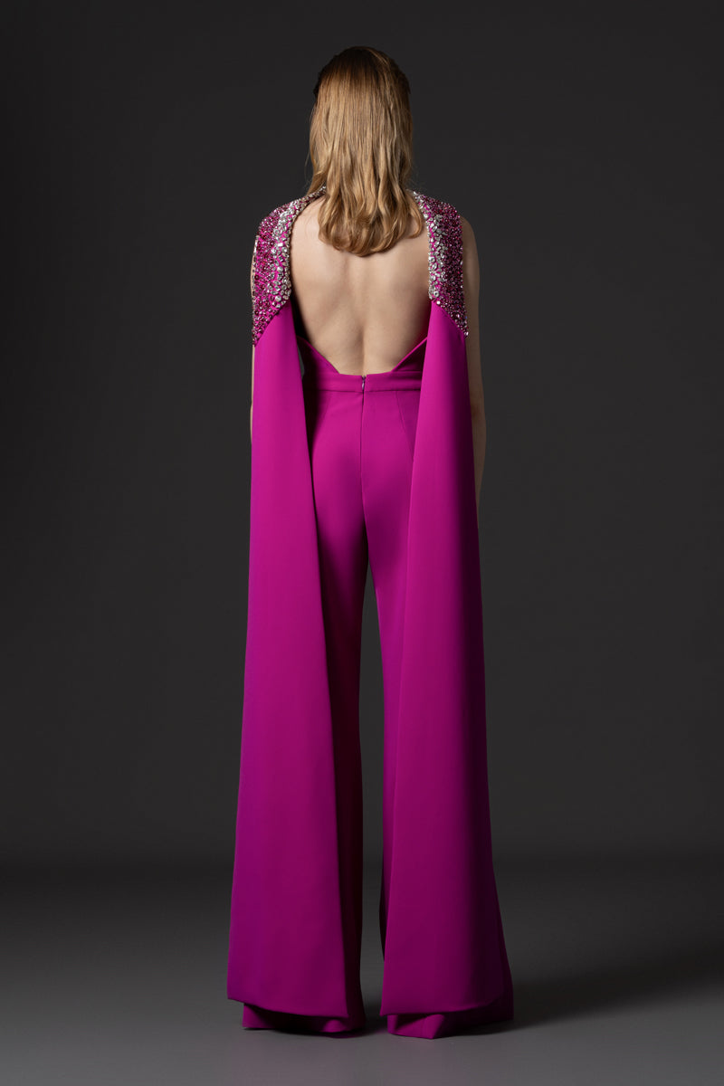 A crêpe jumpsuit with an open back and crystal embroidered neckline