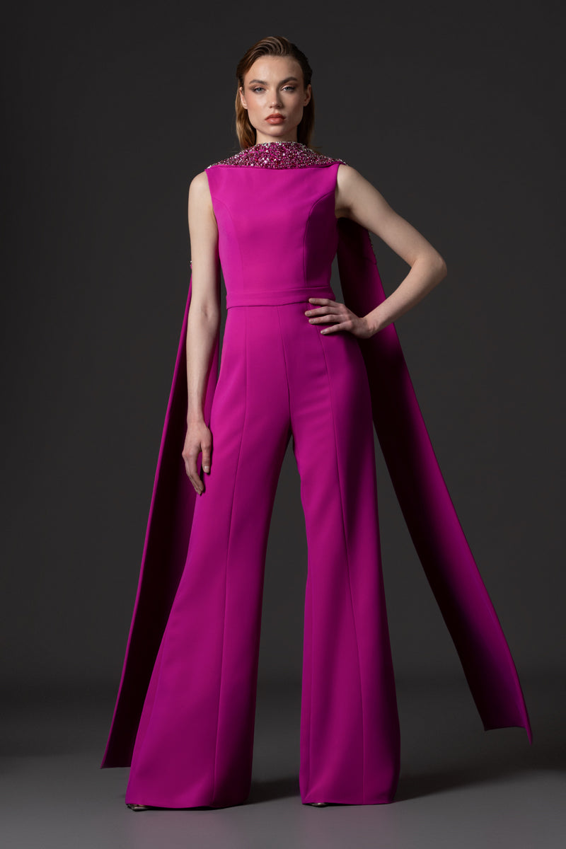 A crêpe jumpsuit with an open back and crystal embroidered neckline