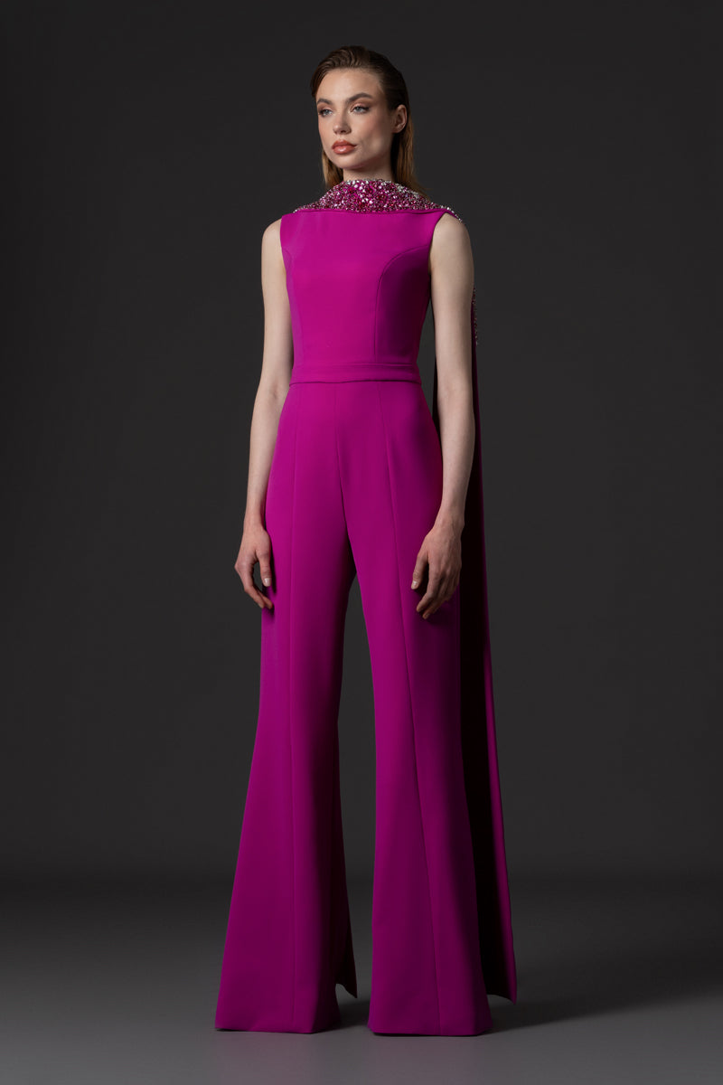 A crêpe jumpsuit with an open back and crystal embroidered neckline