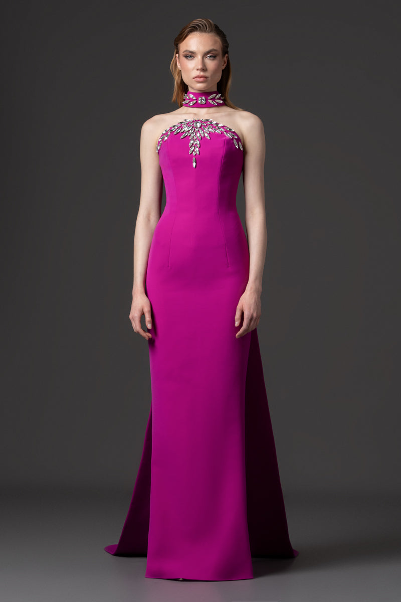 A fitted strapless crêpe gown embellished with crystal embroidery on choker and bust