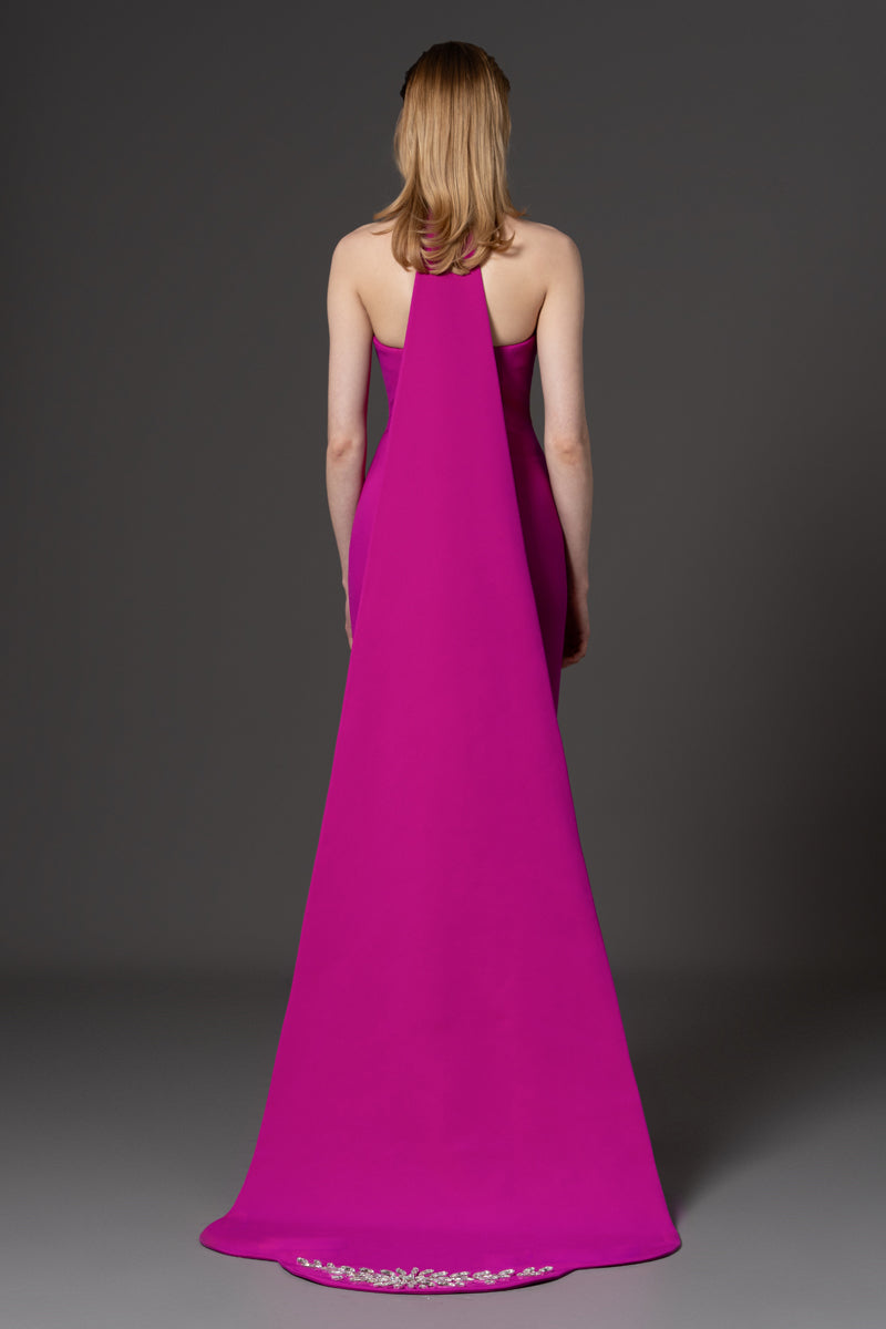 A fitted strapless crêpe gown embellished with crystal embroidery on choker and bust