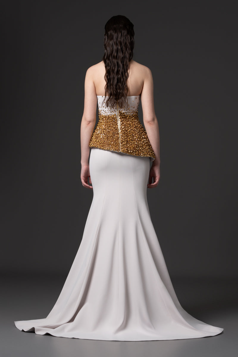 A mermaid dress with asymmetrical beaded corset
