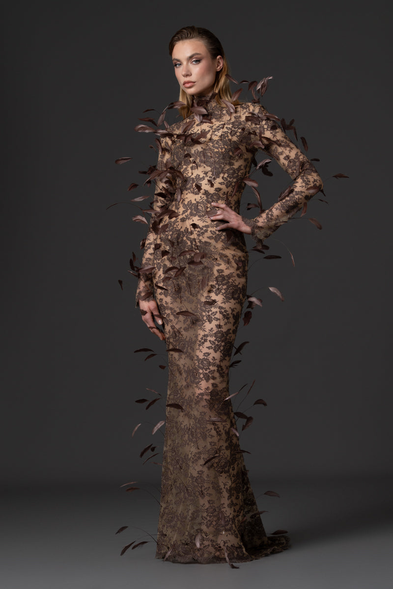 A mermaid long sleeves lace dress with feathers