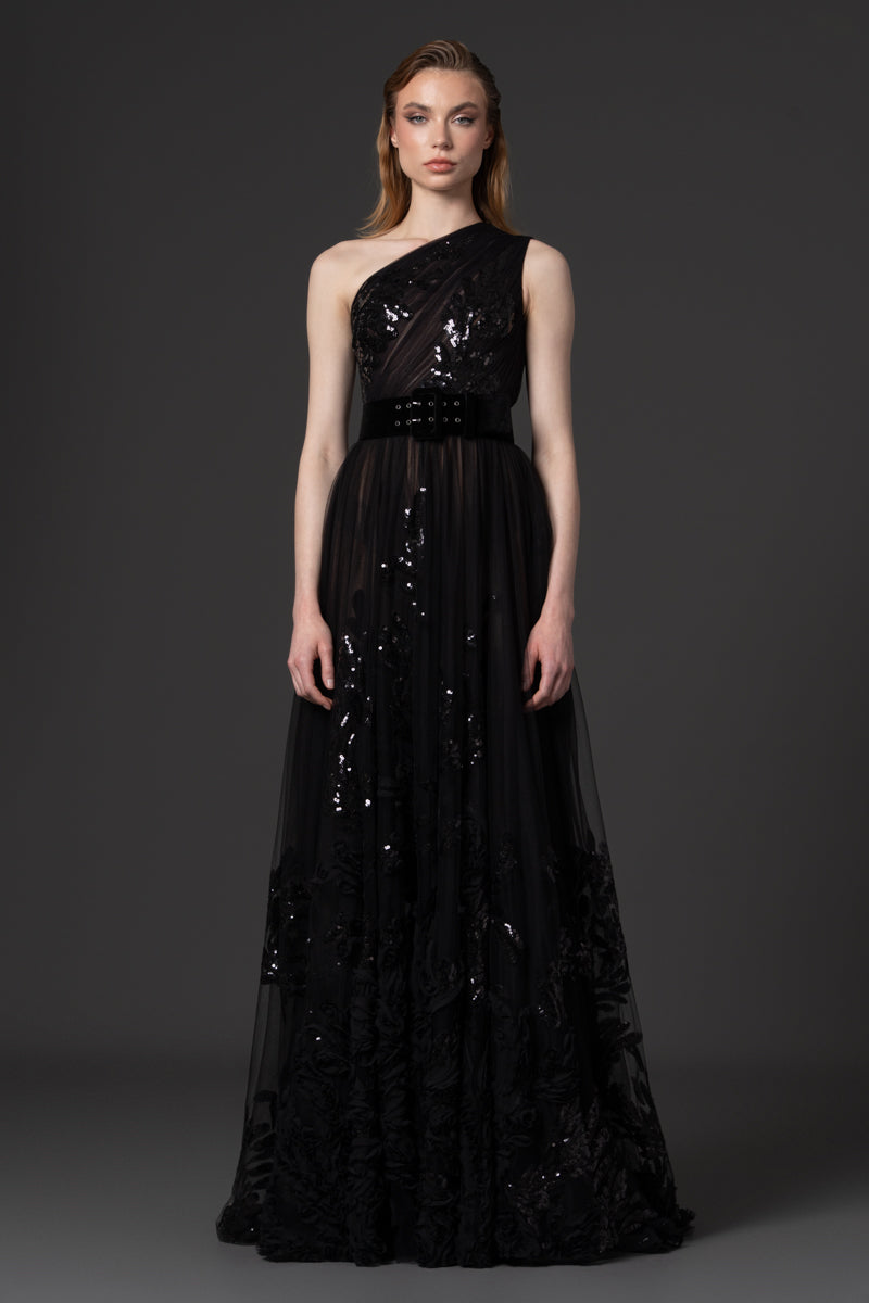 A one-shoulder A-line gown made from sequined beaded tulle and 3D ruffle detailing