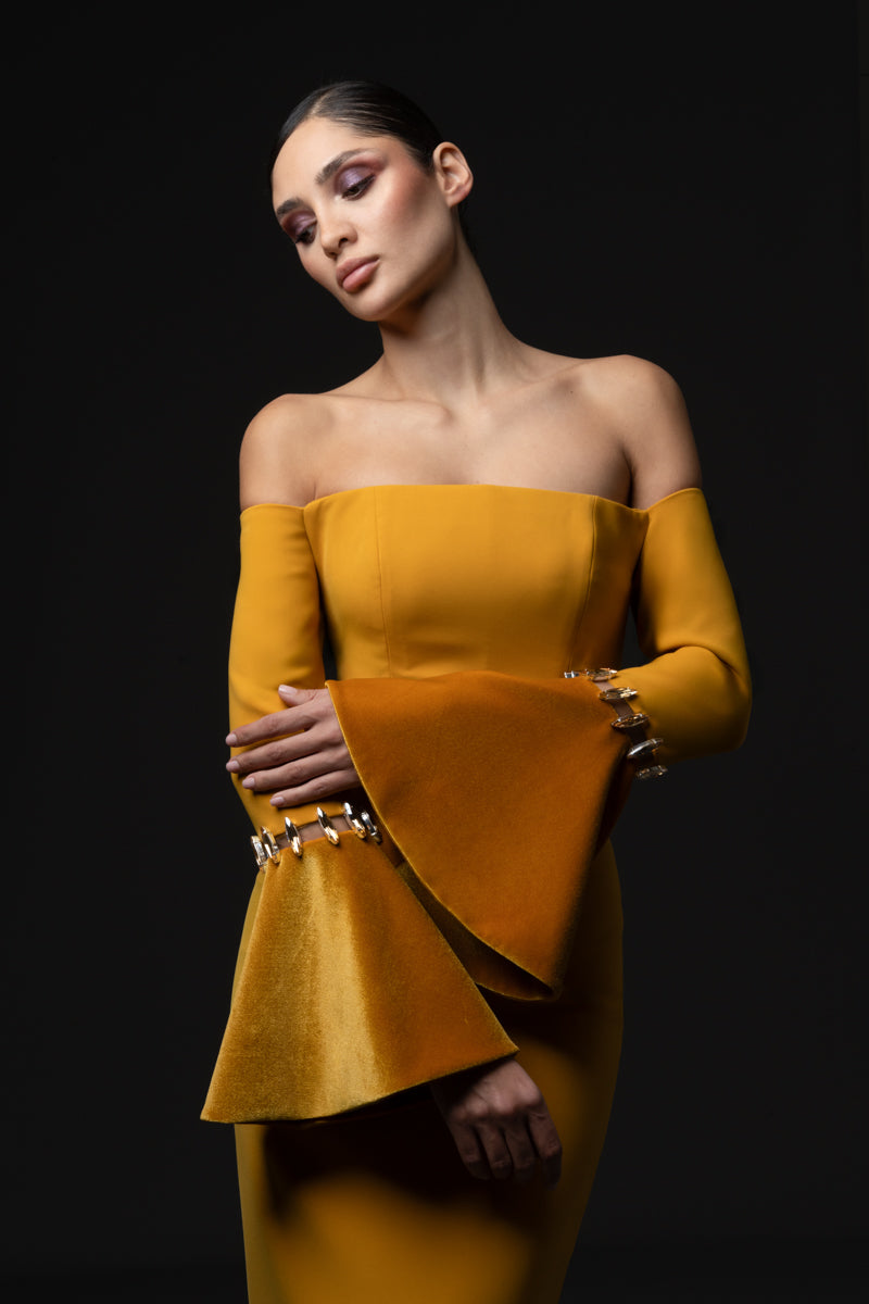 Off-the shoulder dress featuring velvet bell sleeves