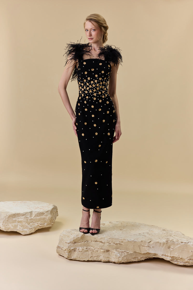 A crêpe fitted midi dress embellished with metallic flowers , stones and feathers on the shoulders.