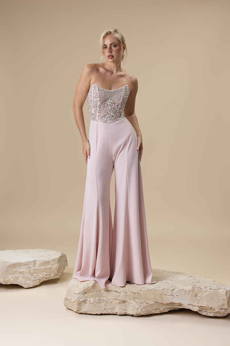 A strapless jumpsuit with an embroidered corset