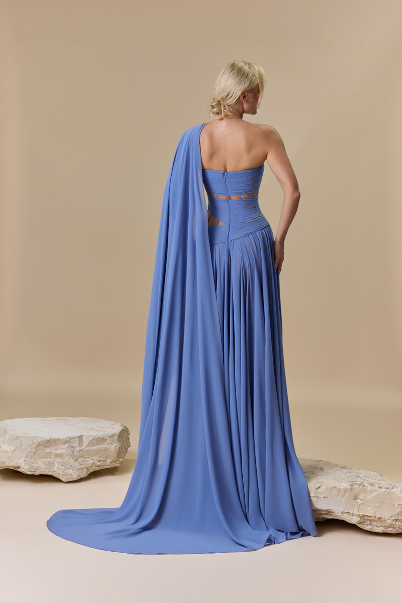 A strapless georgette A line dress with horizontal drapes across the bodice, and a soft flowing floor-length skirt.