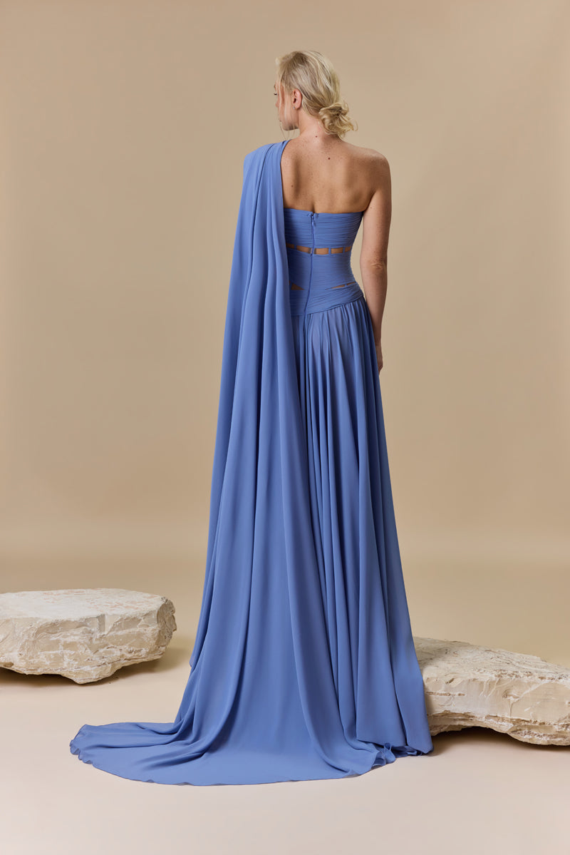 A strapless georgette A line dress with horizontal drapes across the bodice, and a soft flowing floor-length skirt.