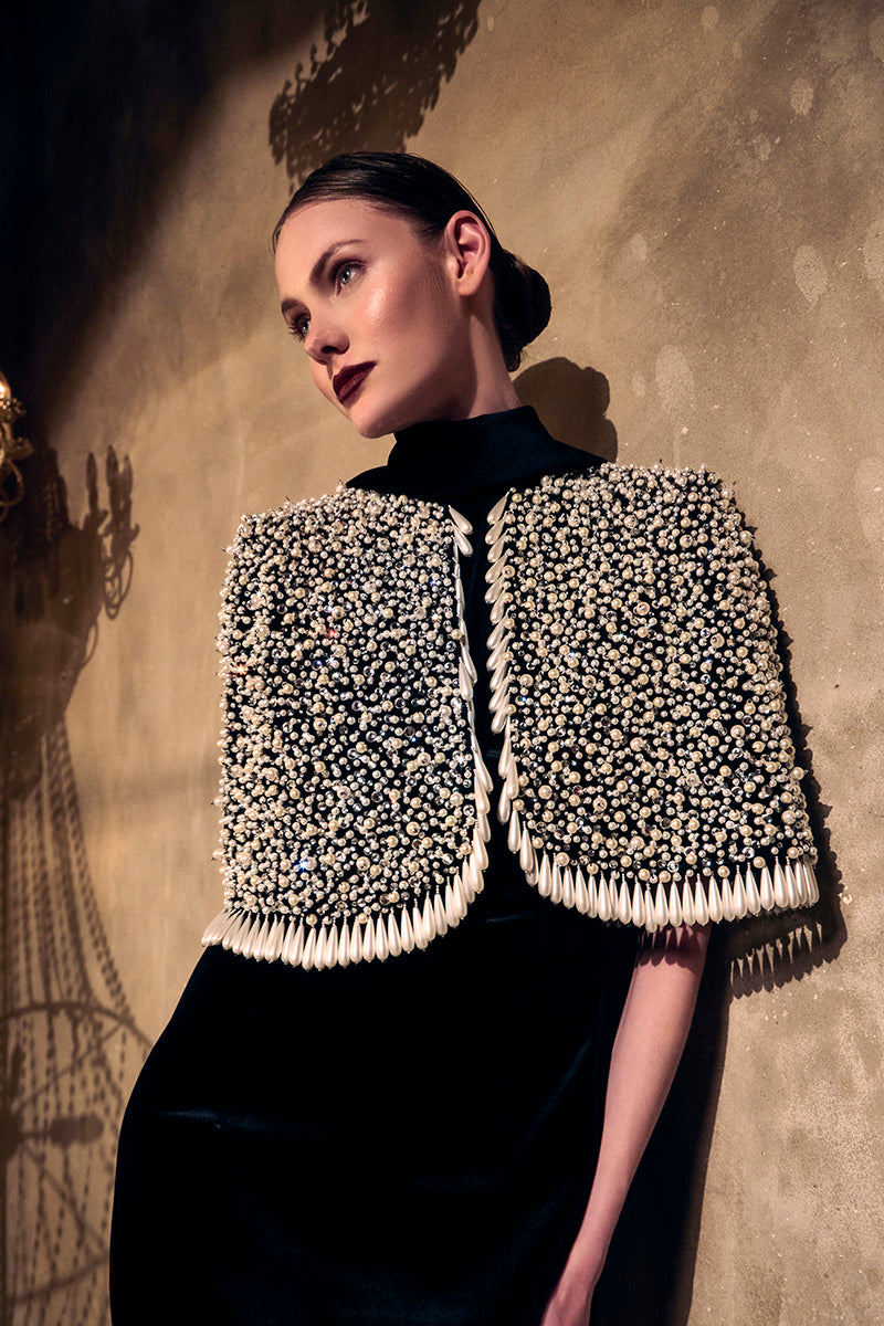 Black velvet dress paired with a fully embroidered bolero