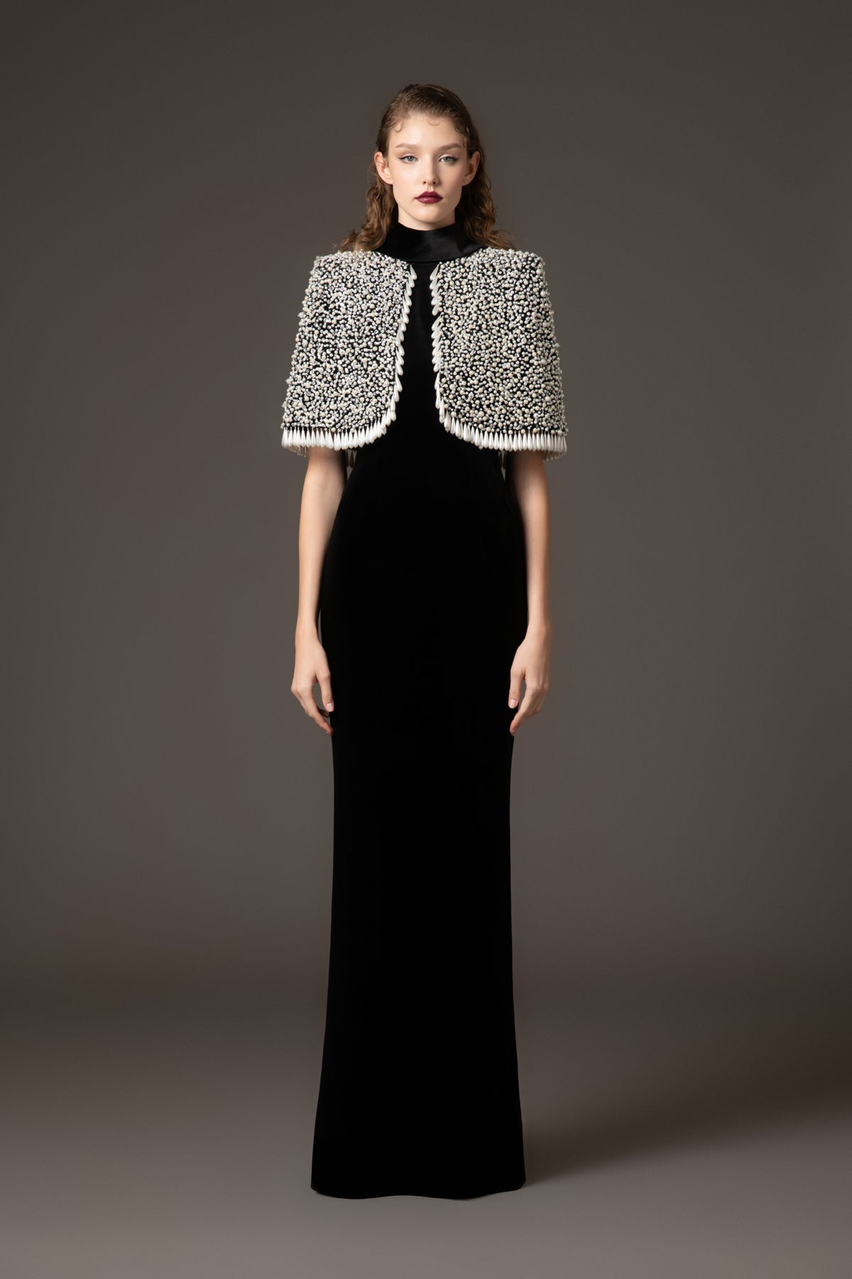 Black velvet dress paired with a fully embroidered bolero