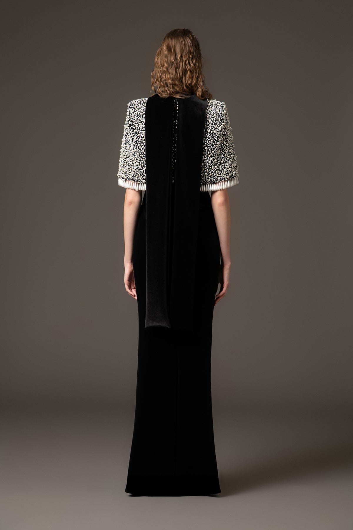 Black velvet dress paired with a fully embroidered bolero