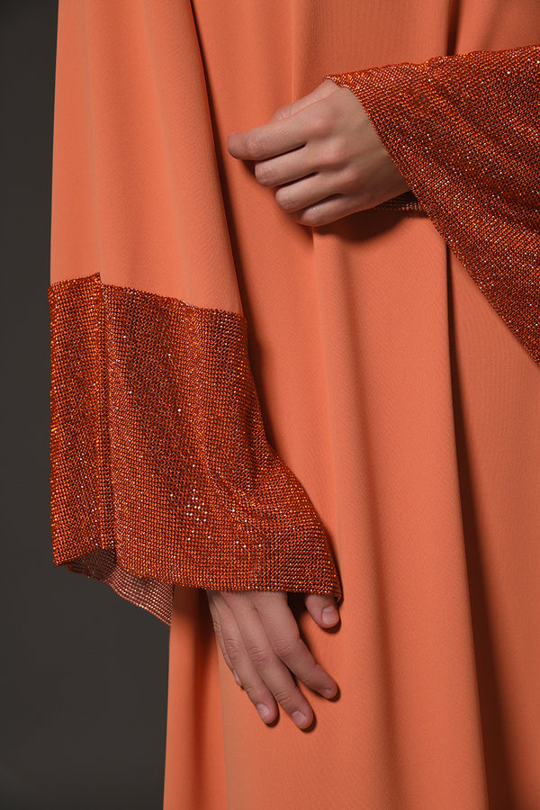  Orange crêpe abaya with crystal embellished chainmail along the neckline and sleeves