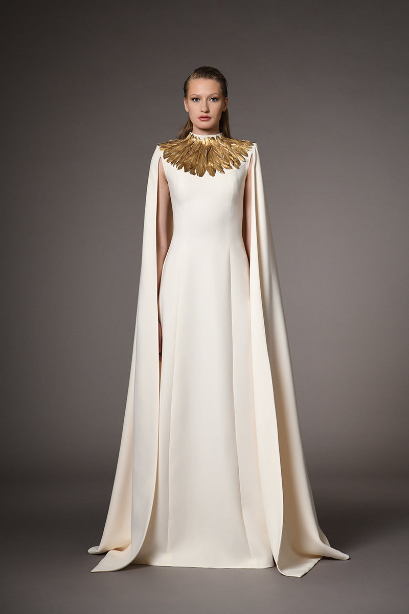 Ivory white cape dress with gold feathers