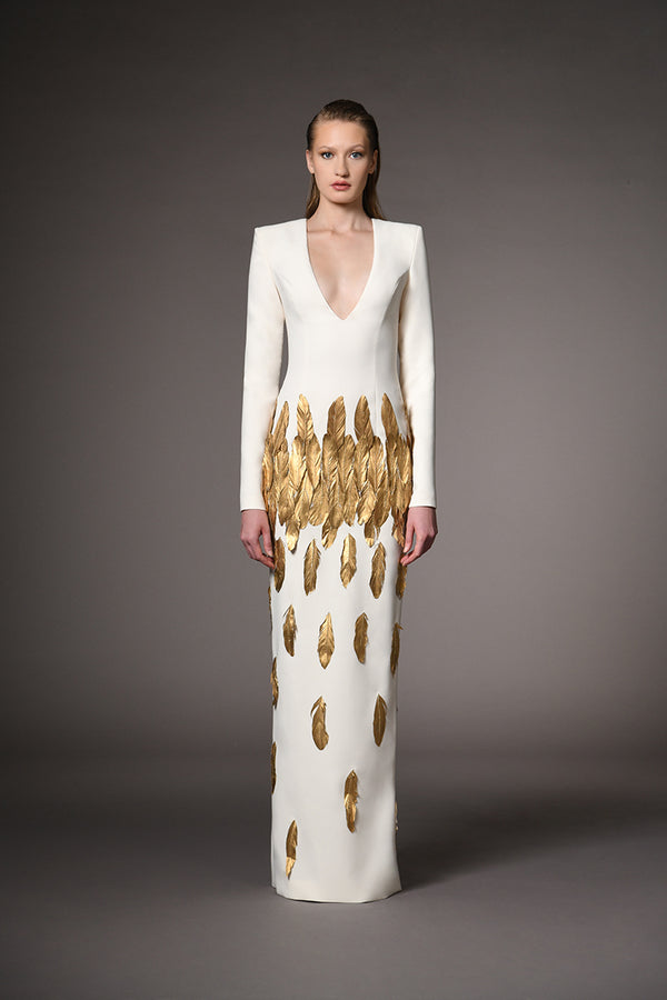 Ivory white long sleeved dress with gold feathers