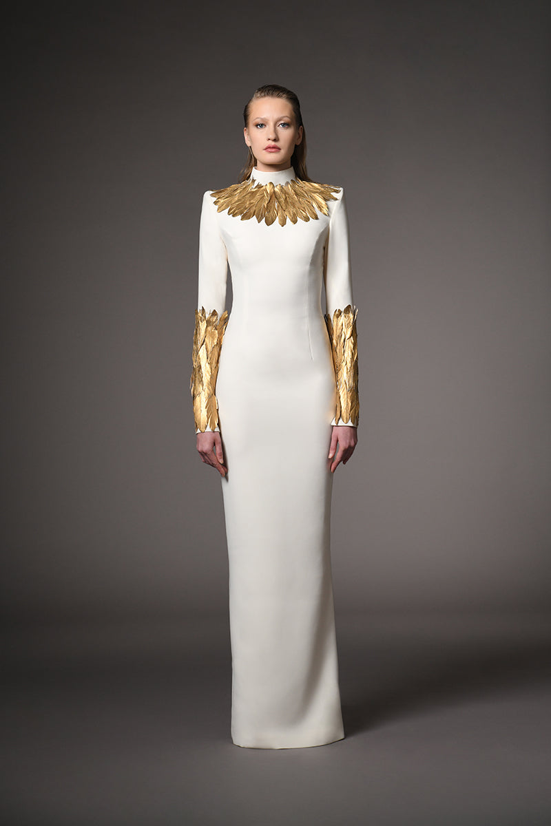 Ivory white dress with gold feathers on the neckline and sleeves Ivory white dress with gold feathers on the neckline and sleeves