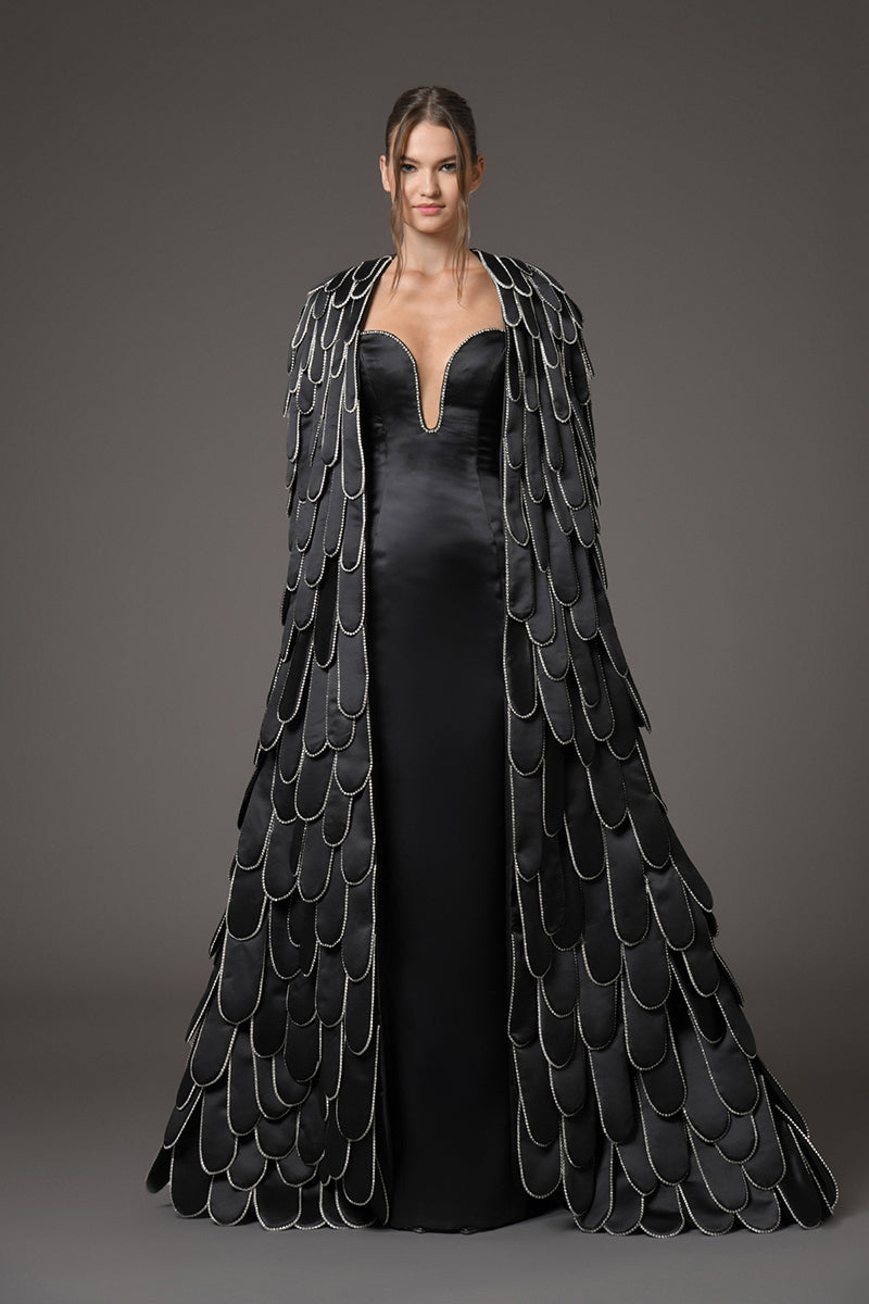 Black silk scuba dress featuring a cape Black silk scuba dress featuring a cape