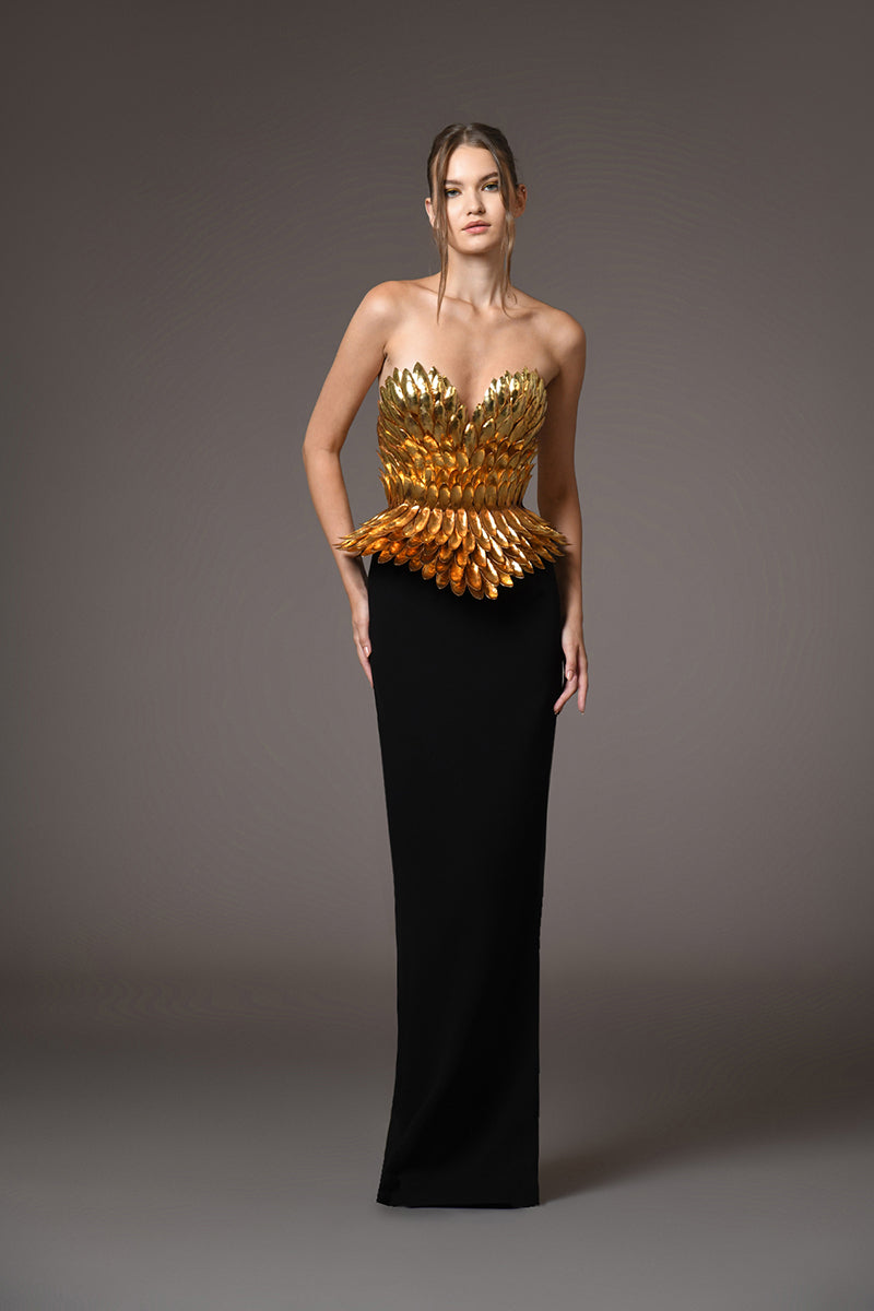 Armor gold-plated corset hand-crafted from solid brass paired with a black silk crpe skirt Armor gold-plated corset hand-crafted from solid brass paired with a black silk crpe skirt