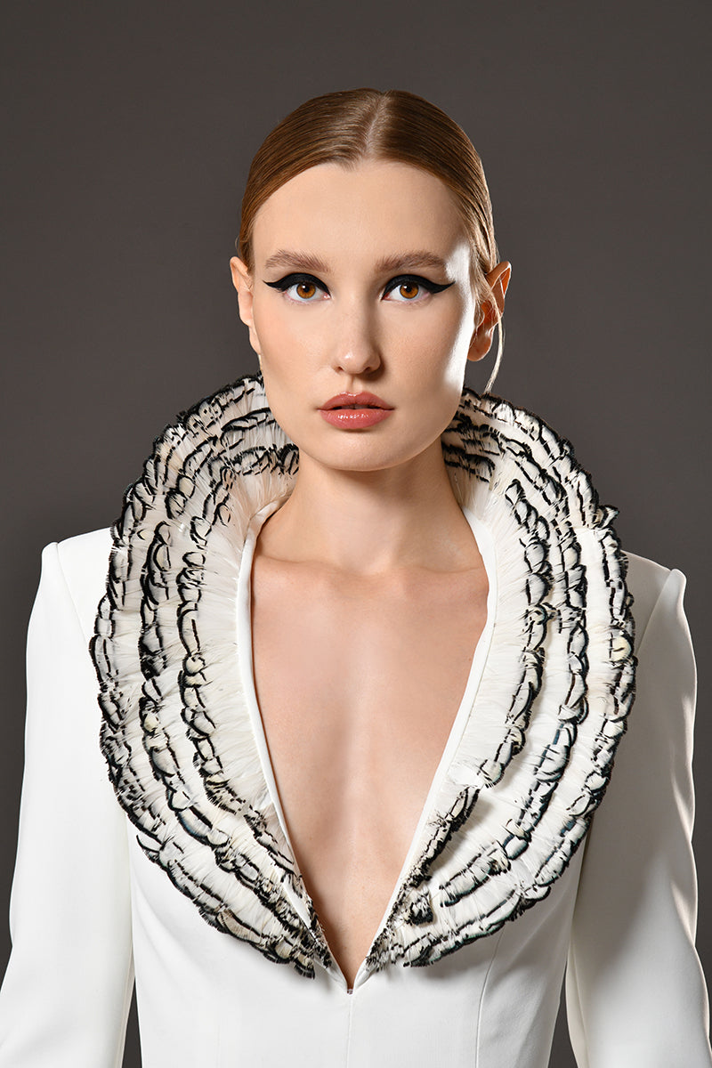 White crêpe jumpsuit with feathers embroidered collar