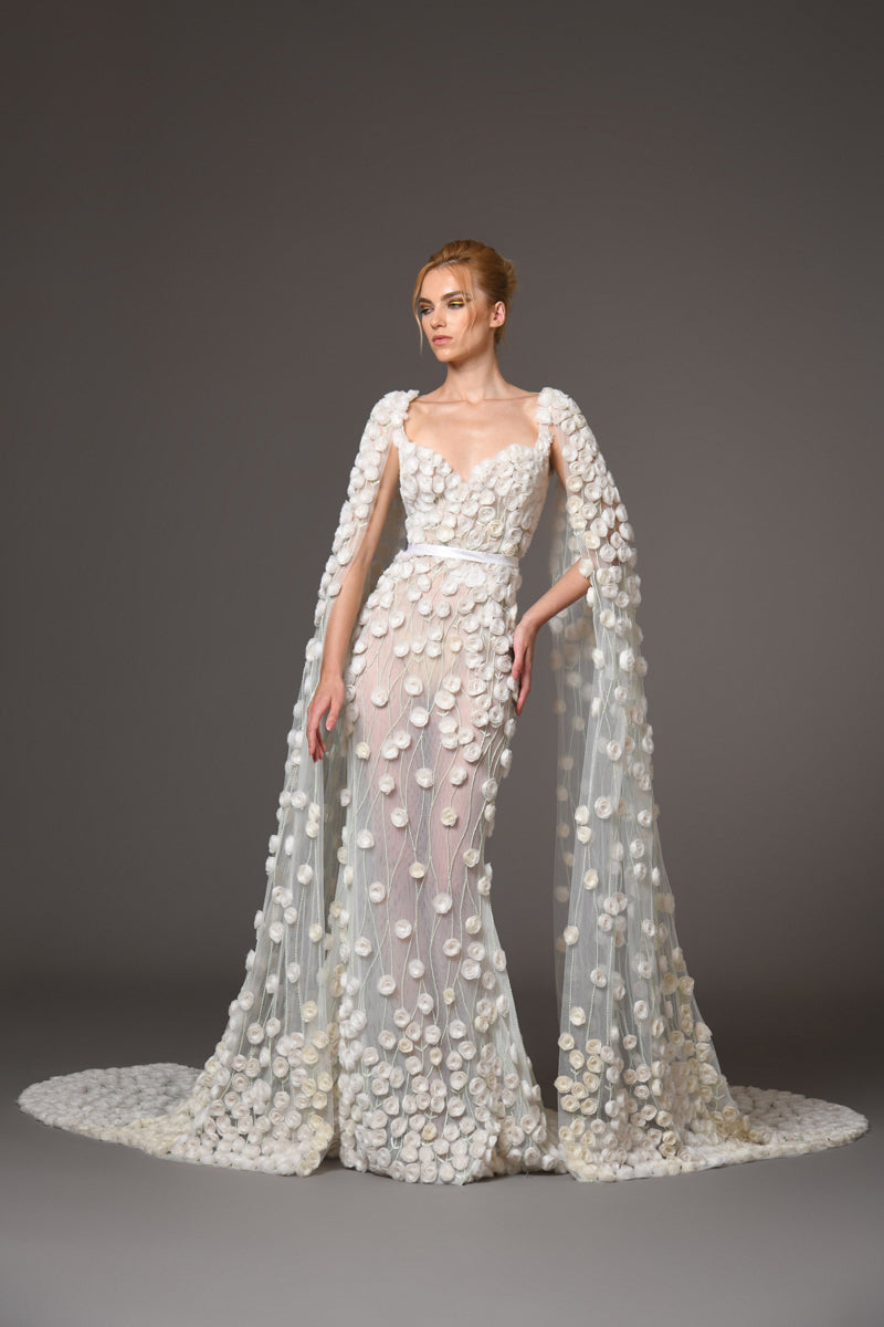 Silk tulle bridal gown with roses and sleeved cape Silk tulle bridal gown with roses and sleeved cape