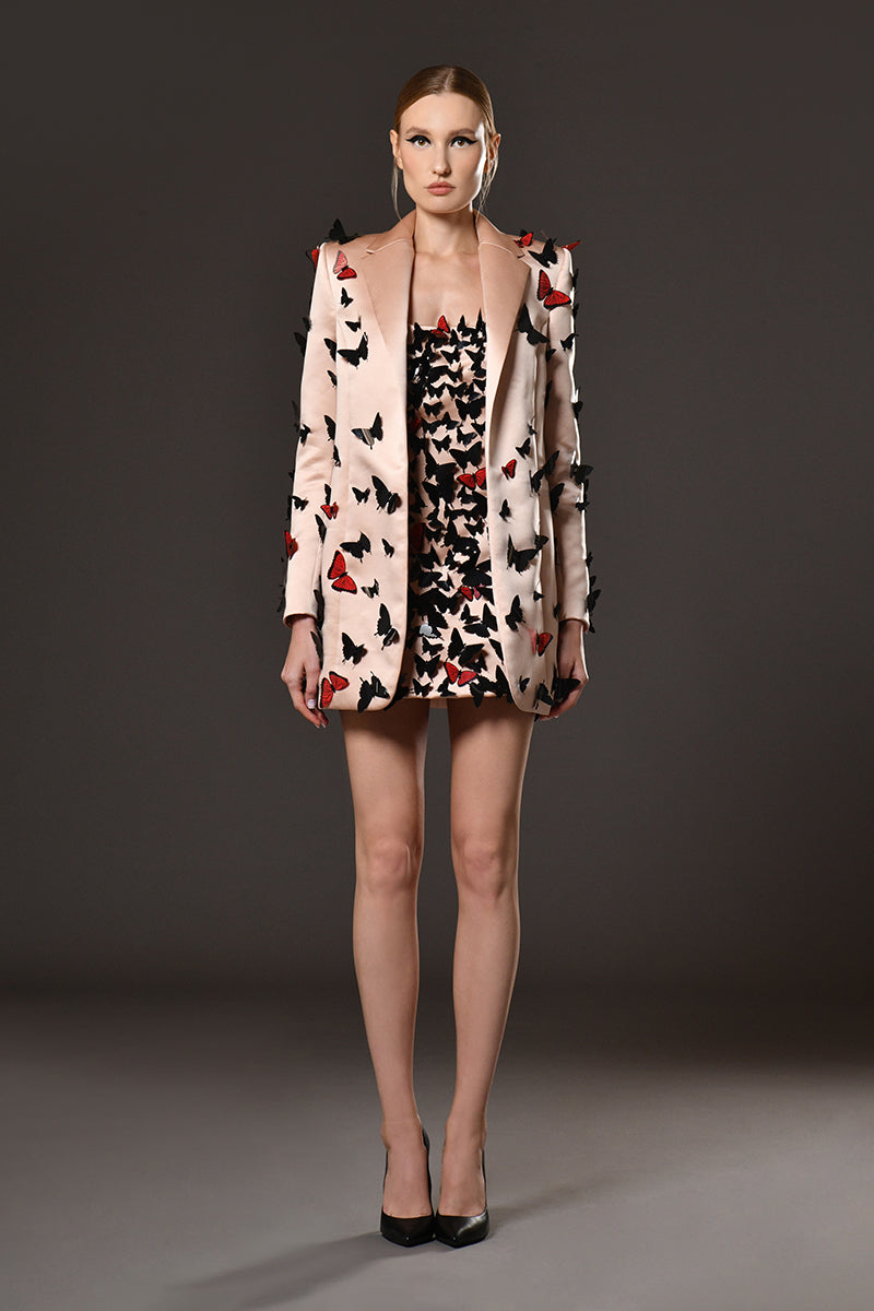 Peach blazer with hand stitched laser-cut butterflies