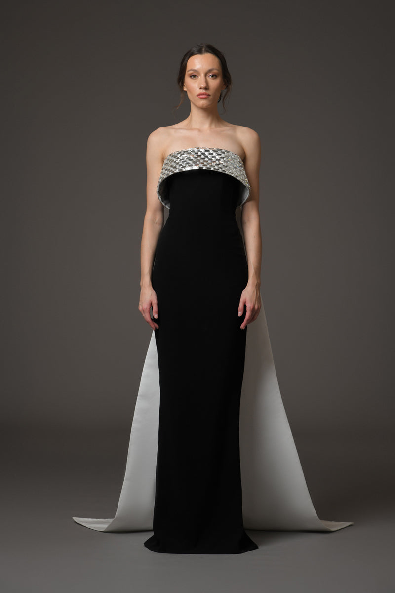 Corseted black crpe dress with baguette embroidery featuring a white Corseted black crpe dress with baguette embroidery featuring a white