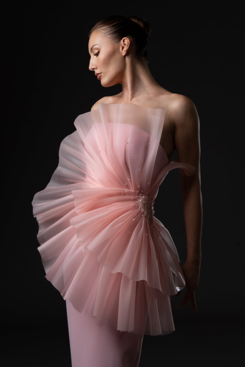 Strapless blush pink crêpe dress, featuring a draped organza bodice with
embroidery