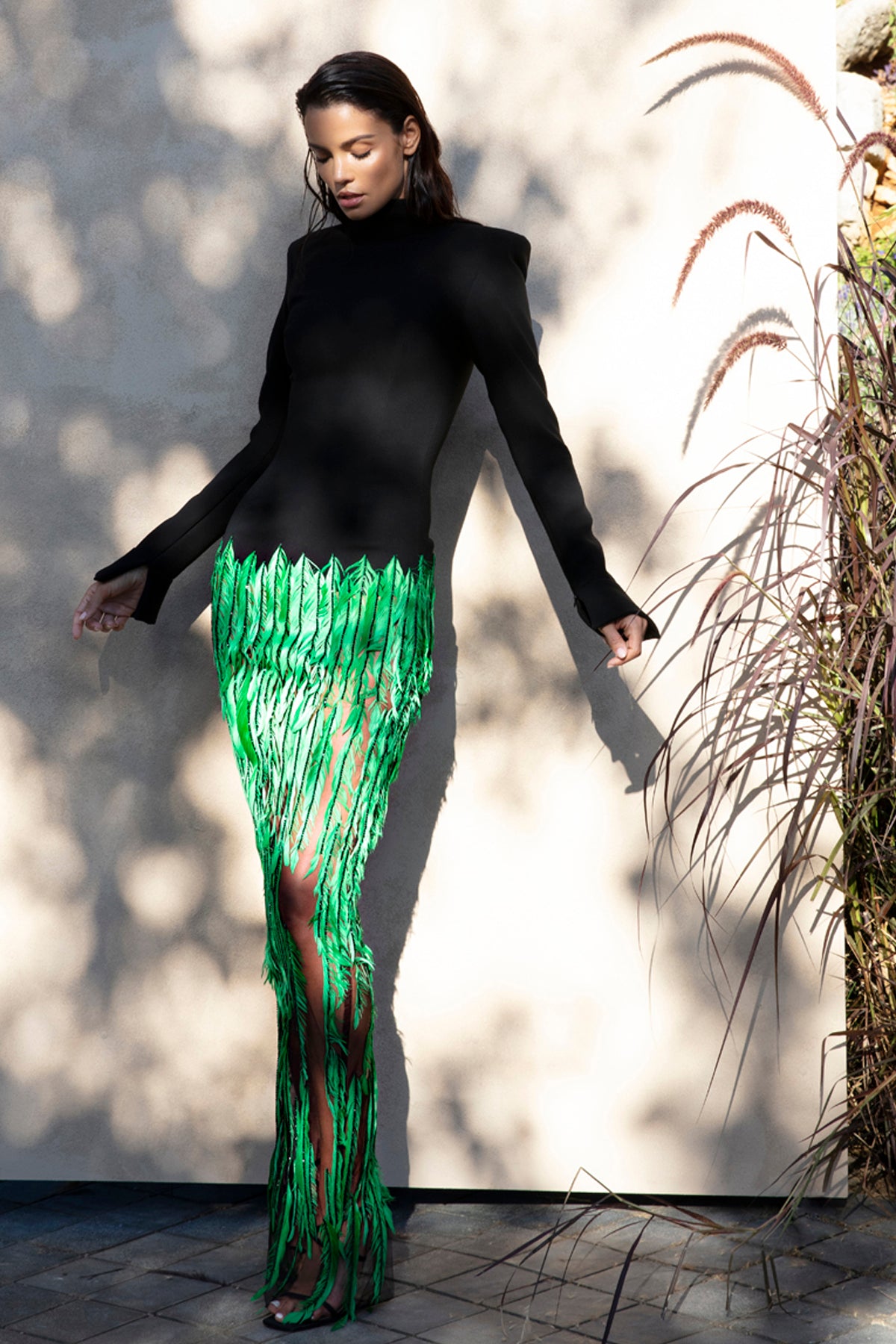 High neck black crpe dress with feathers High neck black crpe dress with feathers
