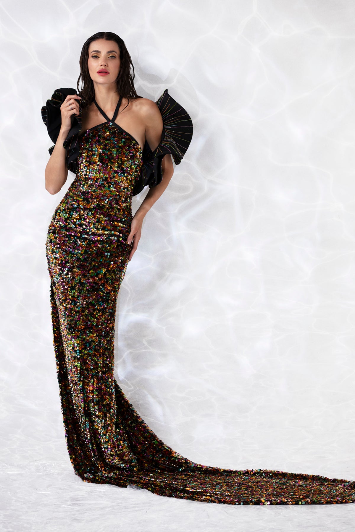 Halter dress in iridescent fish scale sequins and a bolero in taffeta exploded ruffles