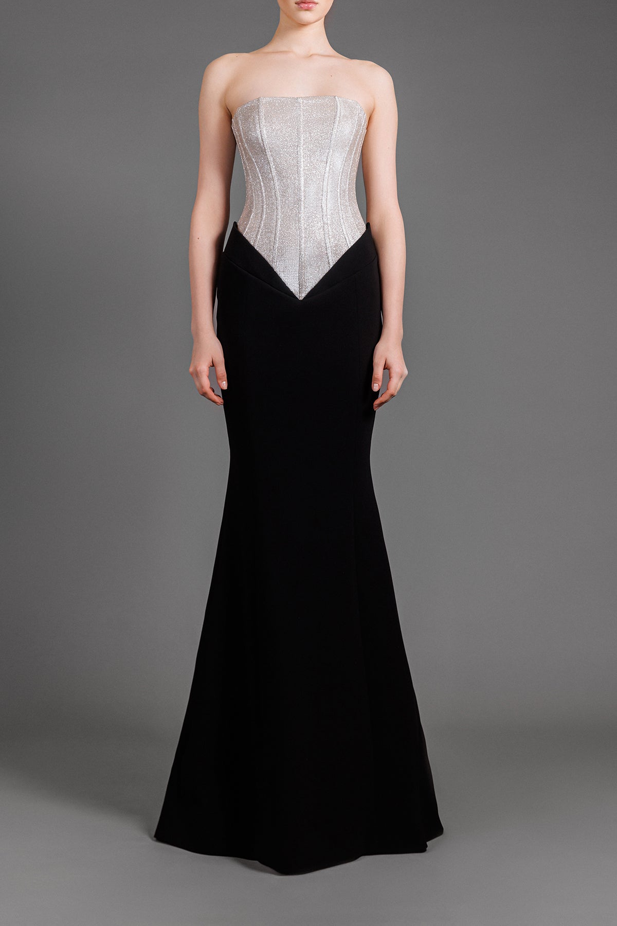 Beige and black strapless dress in lurex and crêpe with structured cor