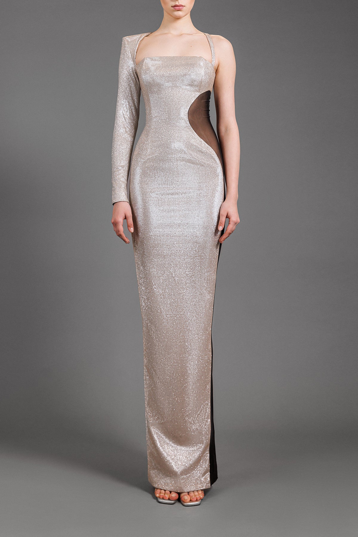 Asymmetrical lurex silver dress with optical illusion tulle detailing Asymmetrical lurex silver dress with optical illusion tulle detailing