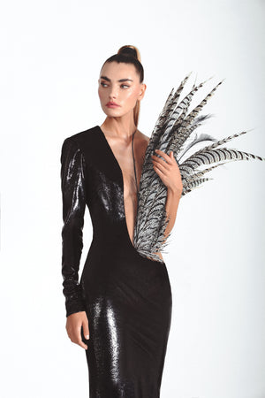 Structured slinky black dress in liquid velvet erupting with lady Amherst plumes