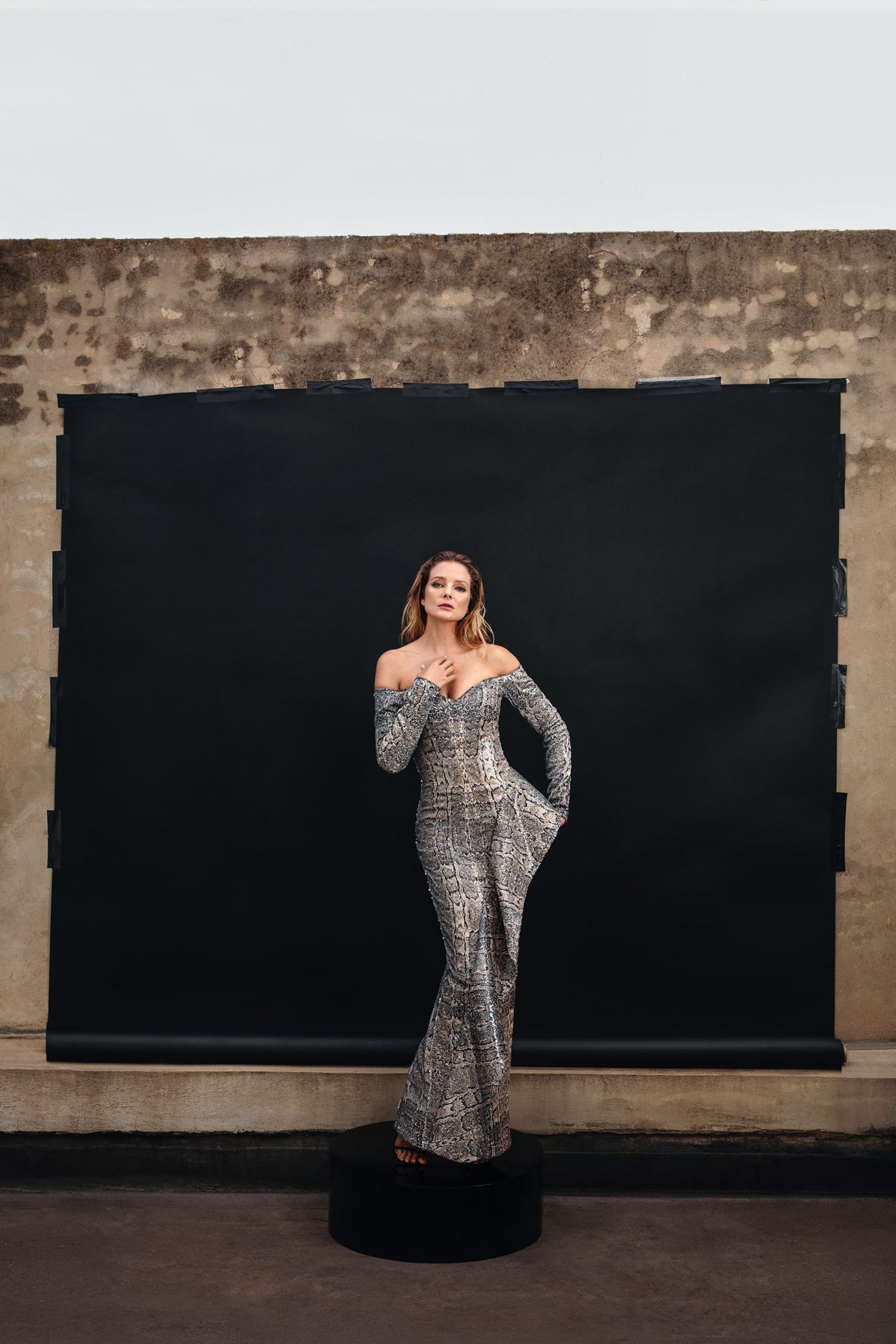 Strapless corseted snakeskin dress