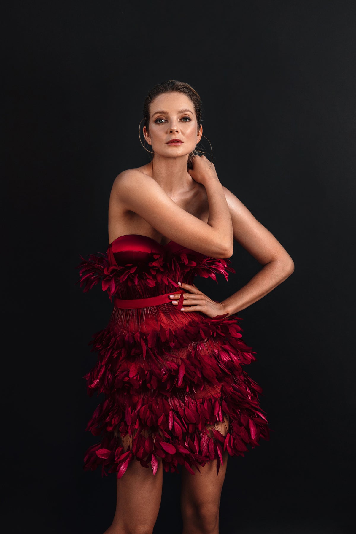 Strapless burgundy corseted mini dress