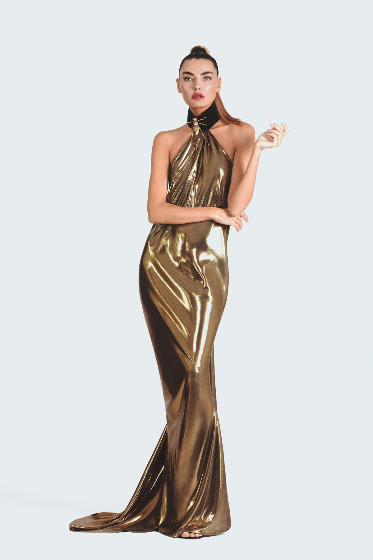 Halter neck dress in liquid gold chiffon featuring handcrafted grasshoppers from solid brass and finished with hand-applied antique gold