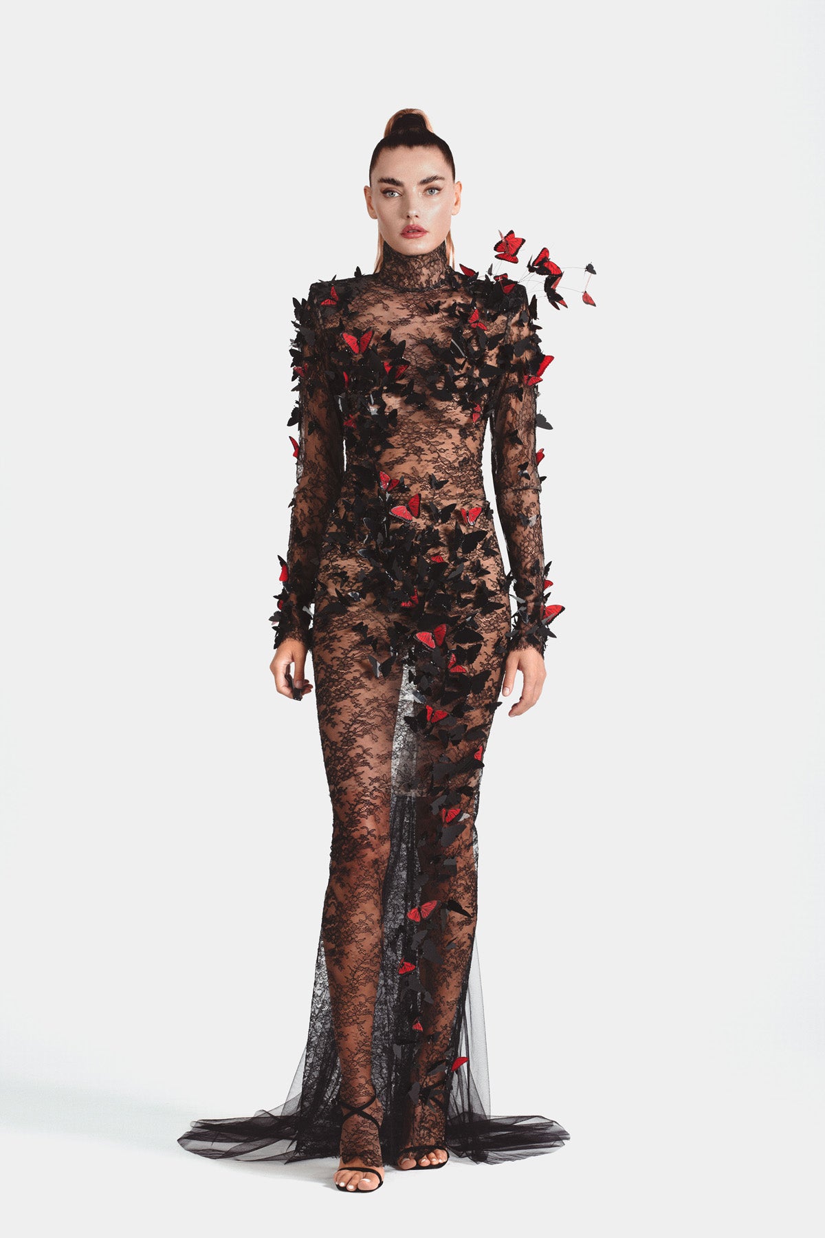 Slinky black Chantilly lace dress embellished with 3D laser-cut butterflies