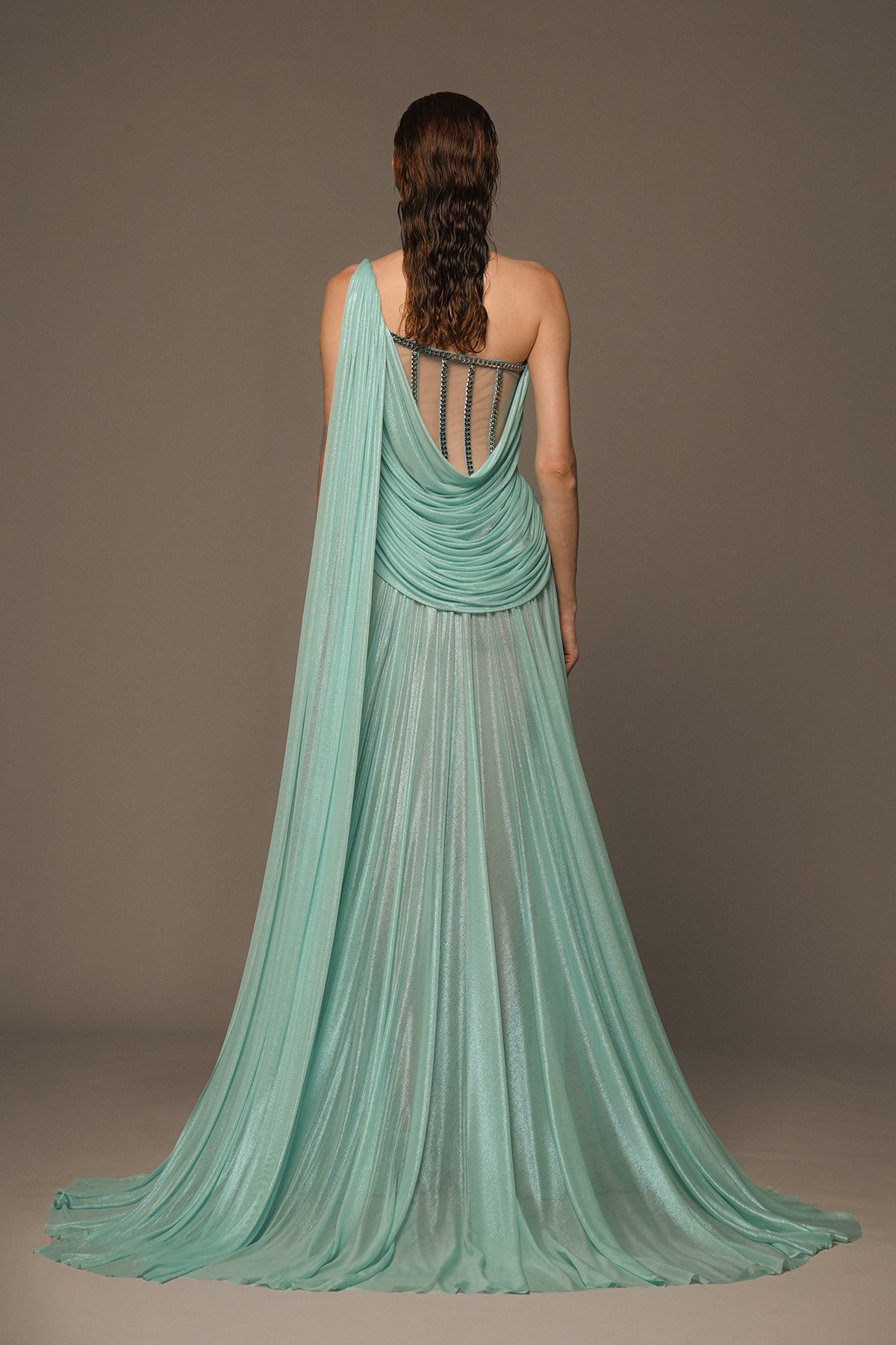 Asymmetrical aqua blue dress in silk foiled tulle with train