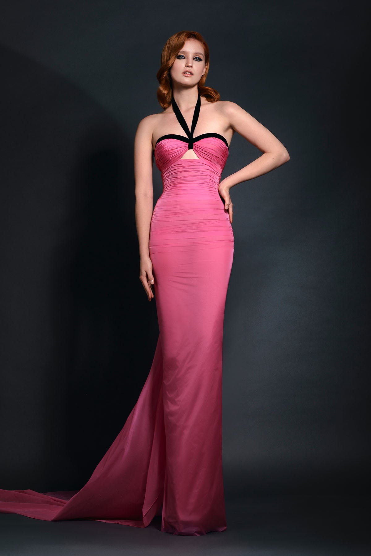 Hot pink impermeable chiffon and black velvet corseted draped dress with ruffled back bow detailing