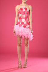 Pink mini dress with embroidered hearts and feathers