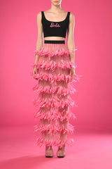 Black top with pink feathers skirt