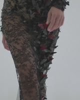 Slinky black Chantilly lace dress embellished with 3D laser-cut butterflies