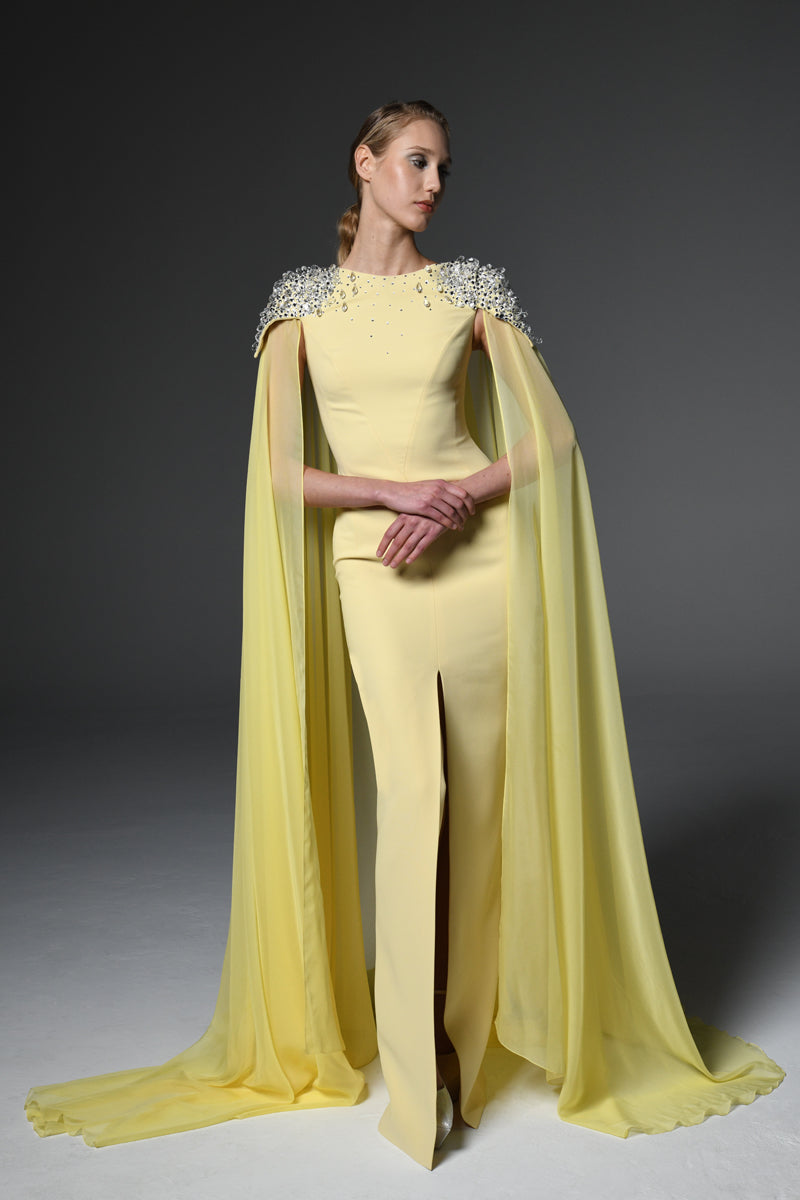 Yellow embroidered crêpe dress featuring chiffon cape