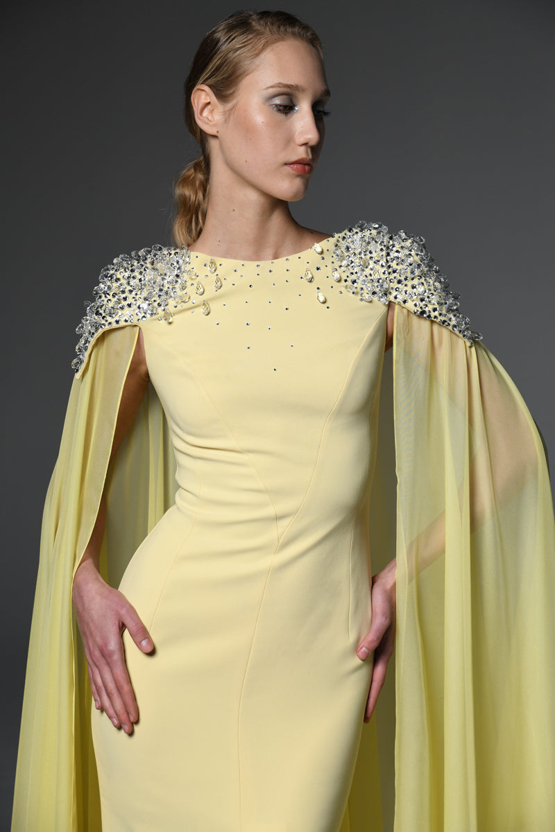 Yellow embroidered crêpe dress featuring chiffon cape